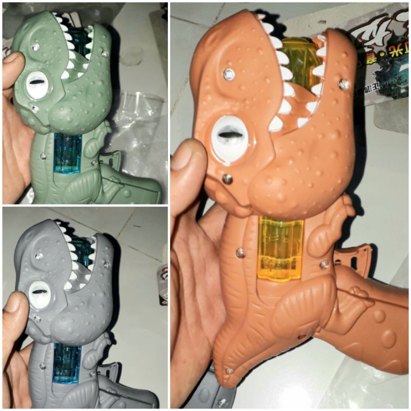 Một cái mô hình khủng long dài 18cm bằng nhựa có nhạc và đèn led rất đẹp tặng kèm pin