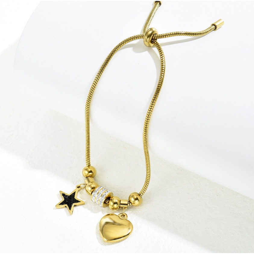 Lắc Tay Dây Rút Mặt Trái Tim Và Ngôi Sao Titan Ko Đen TT 4168