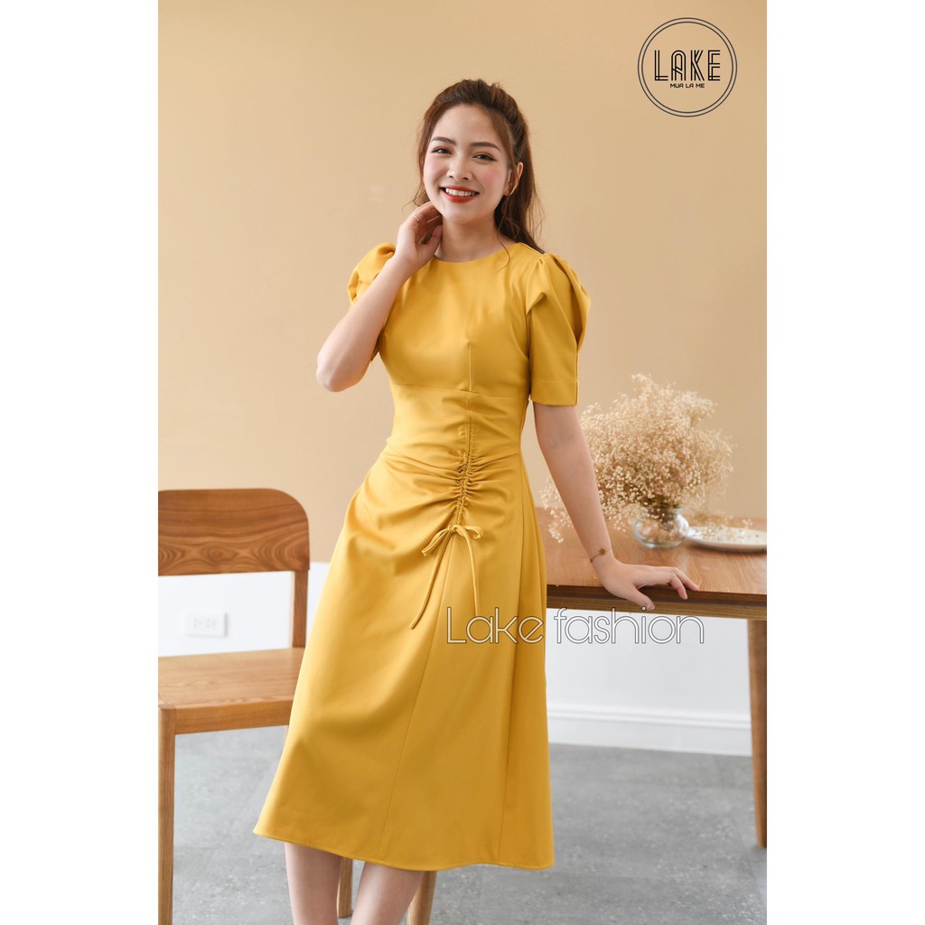 Váy,đầm tay bồng rút eo che bụng lake fashion màu vàng