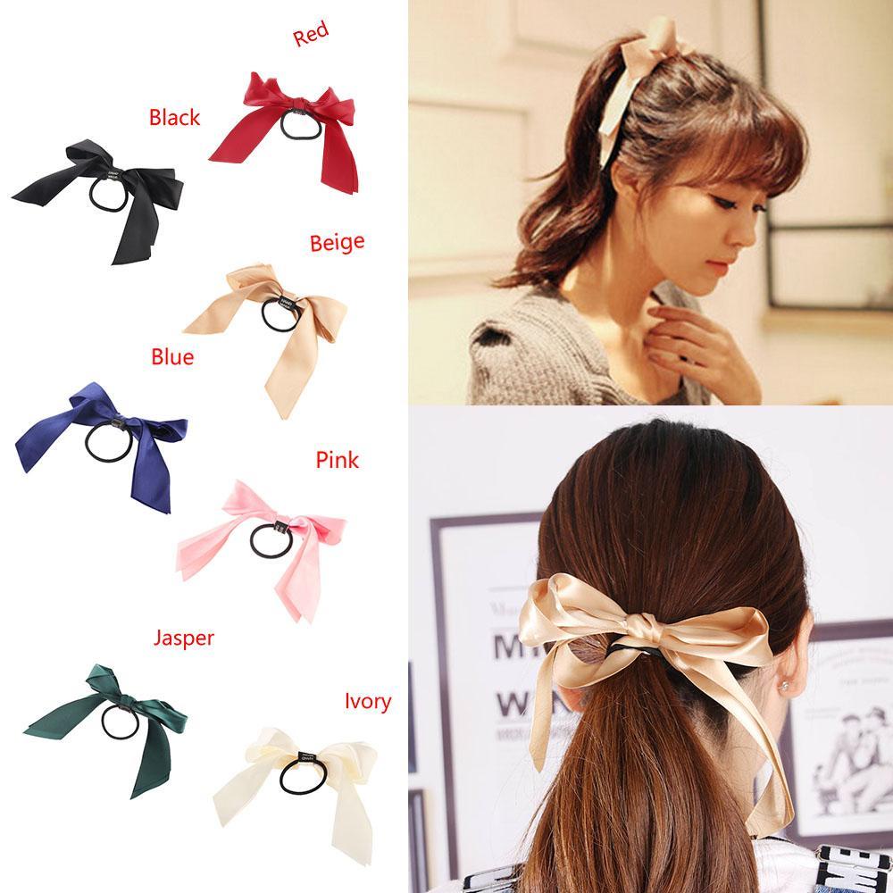 Dây Cột Tóc Co Giãn Đính Nơ Xinh Xắn Cho Nữ