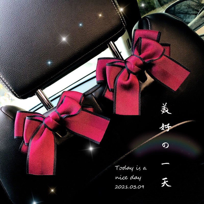 Móc treo đồ sau ghế xe ô tô - Móc treo đồ xe hơi hình nơ