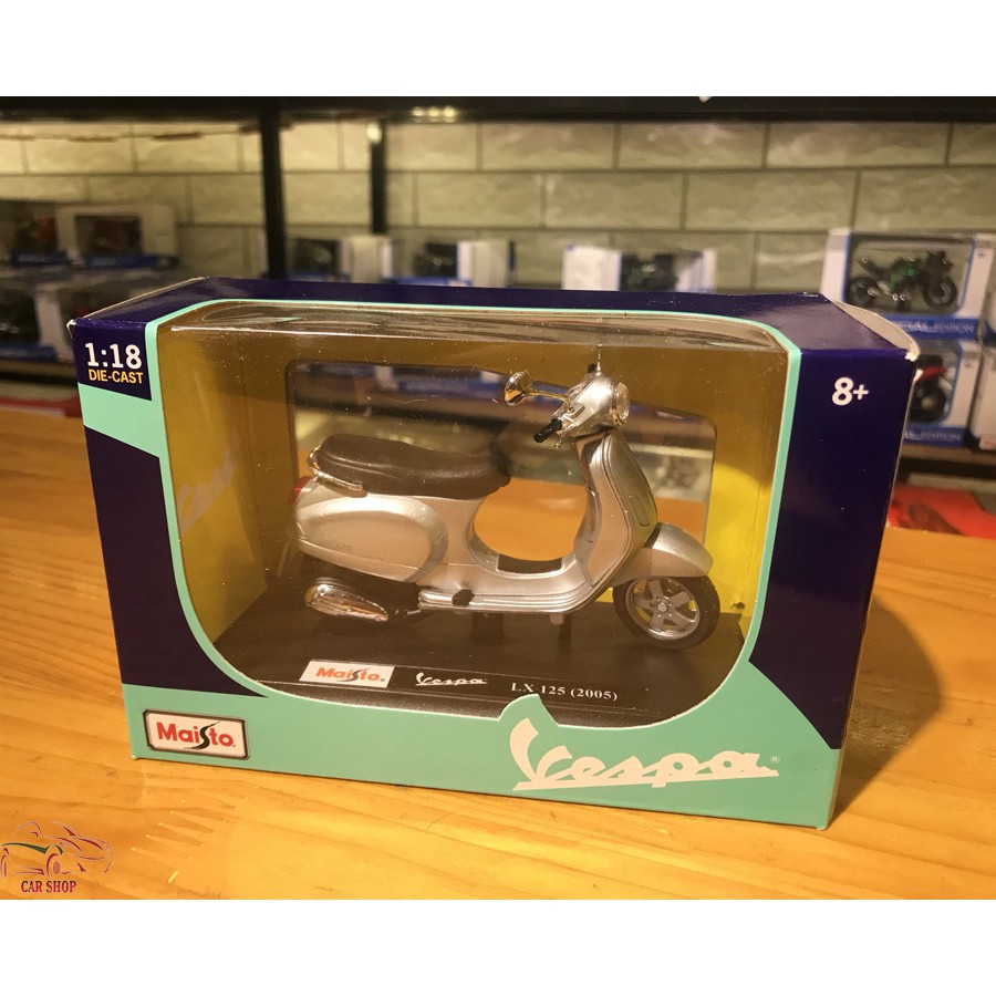 Mô hình xe mô tô Vespa LX125 (2005) tỉ lệ 1/18 màu bạc