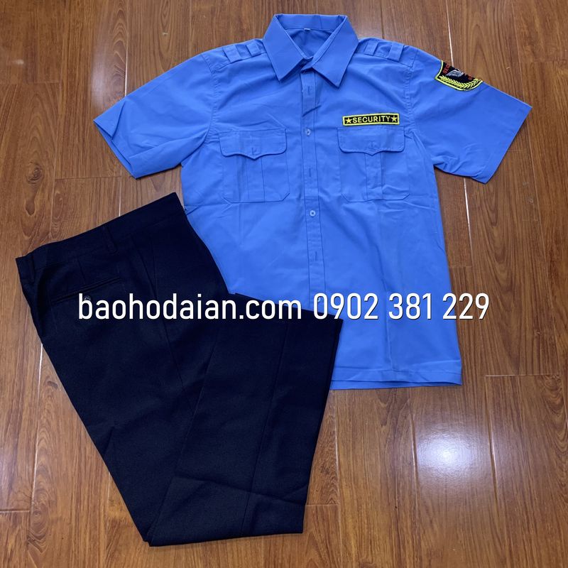 Quần áo bảo vệ màu xanh cộc tay kèm logo tay ngực (quần casme, áo vải xi)