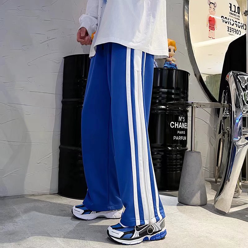 Quần Thể Thao Ống Rộng Phối Khóa Kéo Bên Hông Màu Xanh Dương Có Size M-2XL Thời Trang Xuân Hè Cho Nam