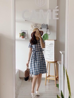 Đầm caro nơ eo .
