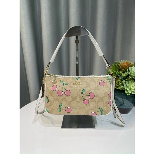 Túi Coach dáng thuyền hoạ tiết xinh xắn