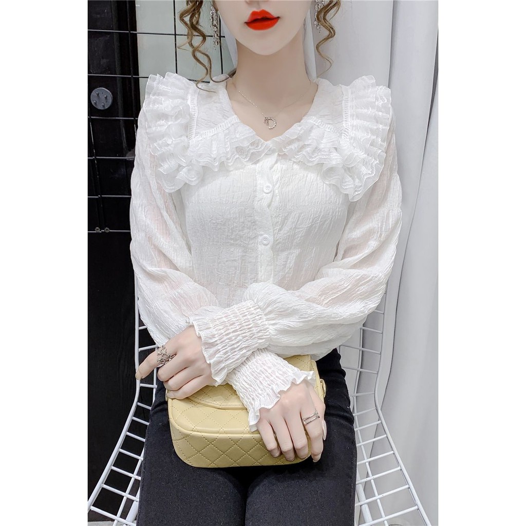 Mùa xuân năm 2021 thiết kế áo kiểu Pháp cổ chữ v mới niche sơ mi trắng cao cấp của phụ nữ dài tay thu đông