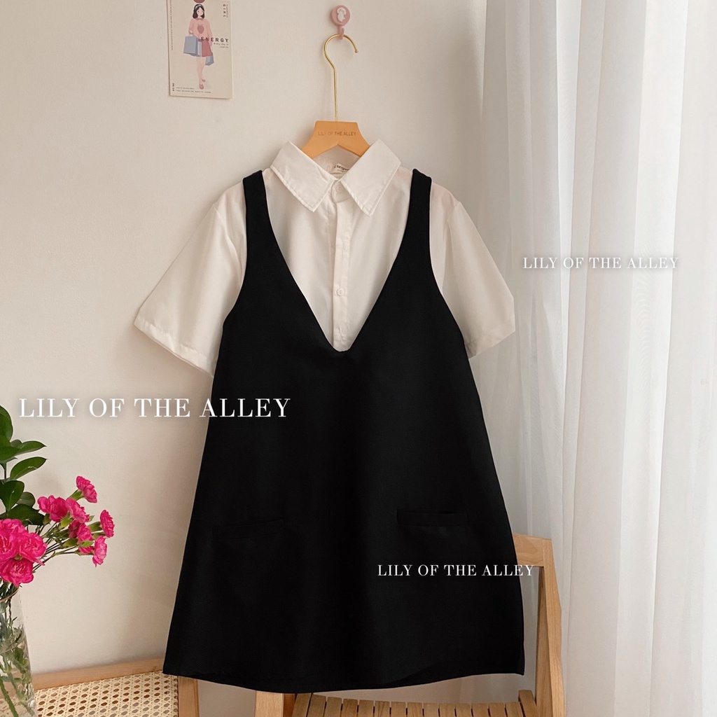 Set sơ mi trắng váy yếm đen
