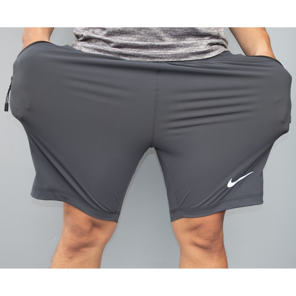 Quần short đùi thể thao nam chất gió co giãn 4 chiều cao cấp thoáng mát mặc mua hè Ni túi zip su | BigBuy360 - bigbuy360.vn