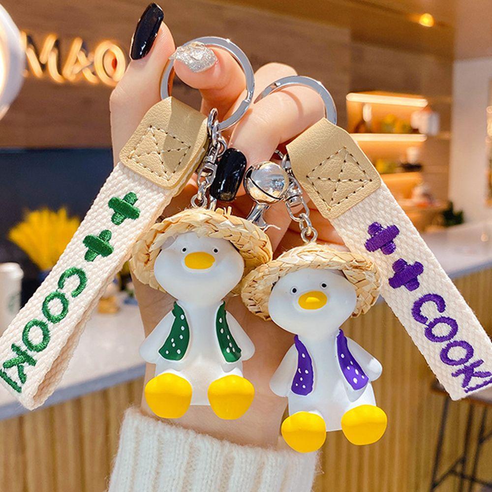 Móc Khóa Hình Chú Vịt Đội Nón Rơm Sáng Tạo Giá Đỡ