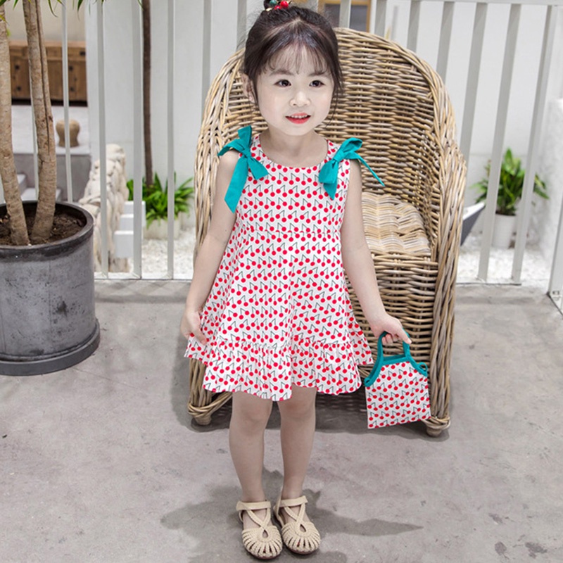 Đầm Công Chúa Hai Dây Đính Nơ In Hoa Se7en Cho Bé Gái