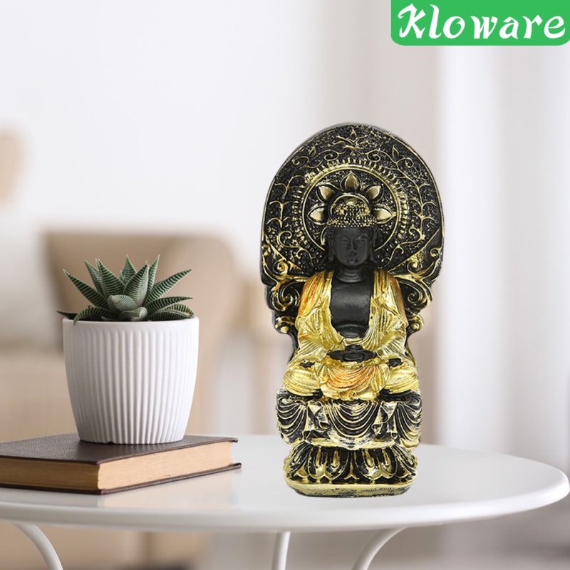 Tượng phật màu vàng và đen dùng để trang trí