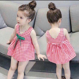 Váy kẻ thô kèm nơ xinh bé gái
