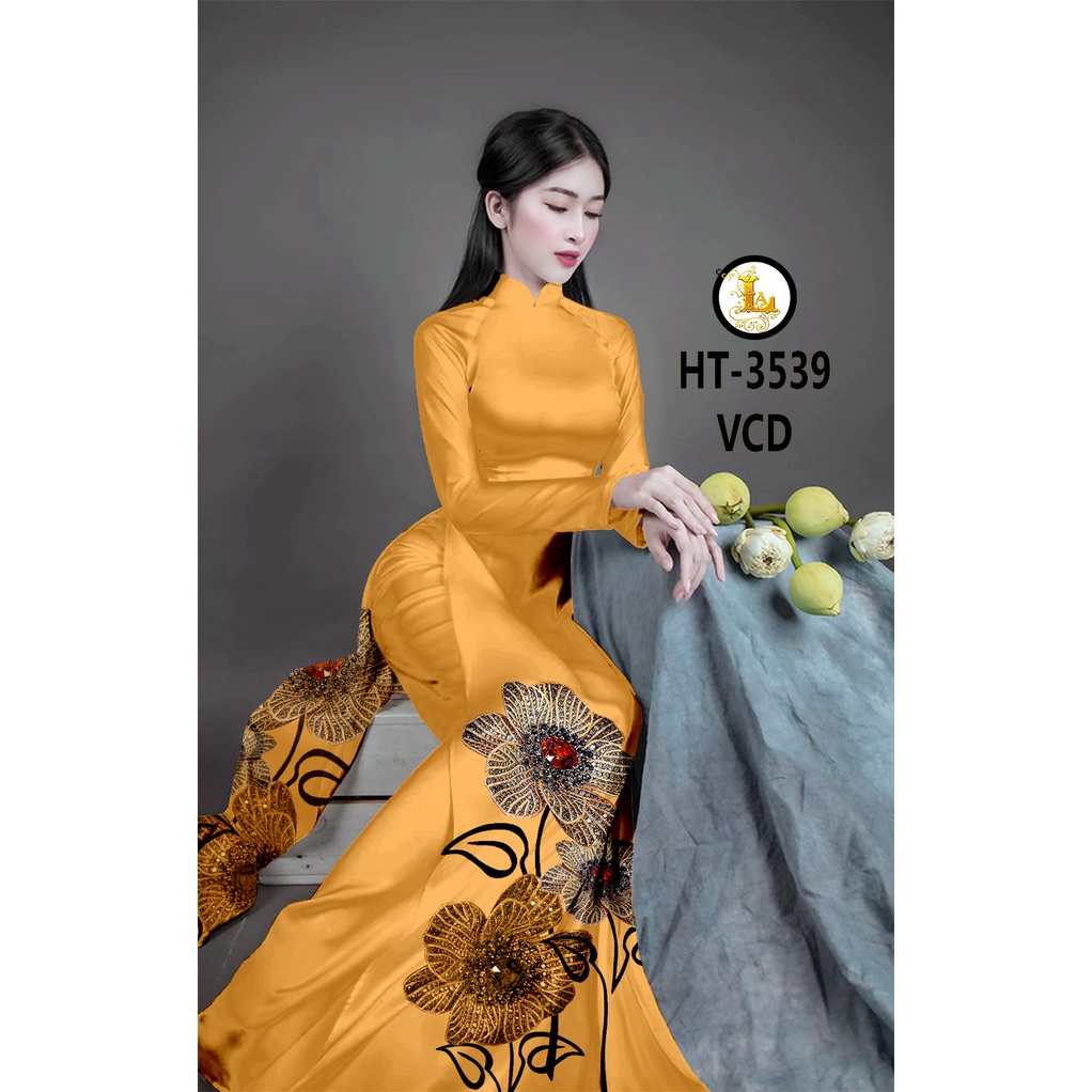 Vải áo dài hoa tà , chất lụa ruby bóng nhẹ, sang trọng, mềm, mượt, mịn, mát, co giãn nhẹ bề ngang.