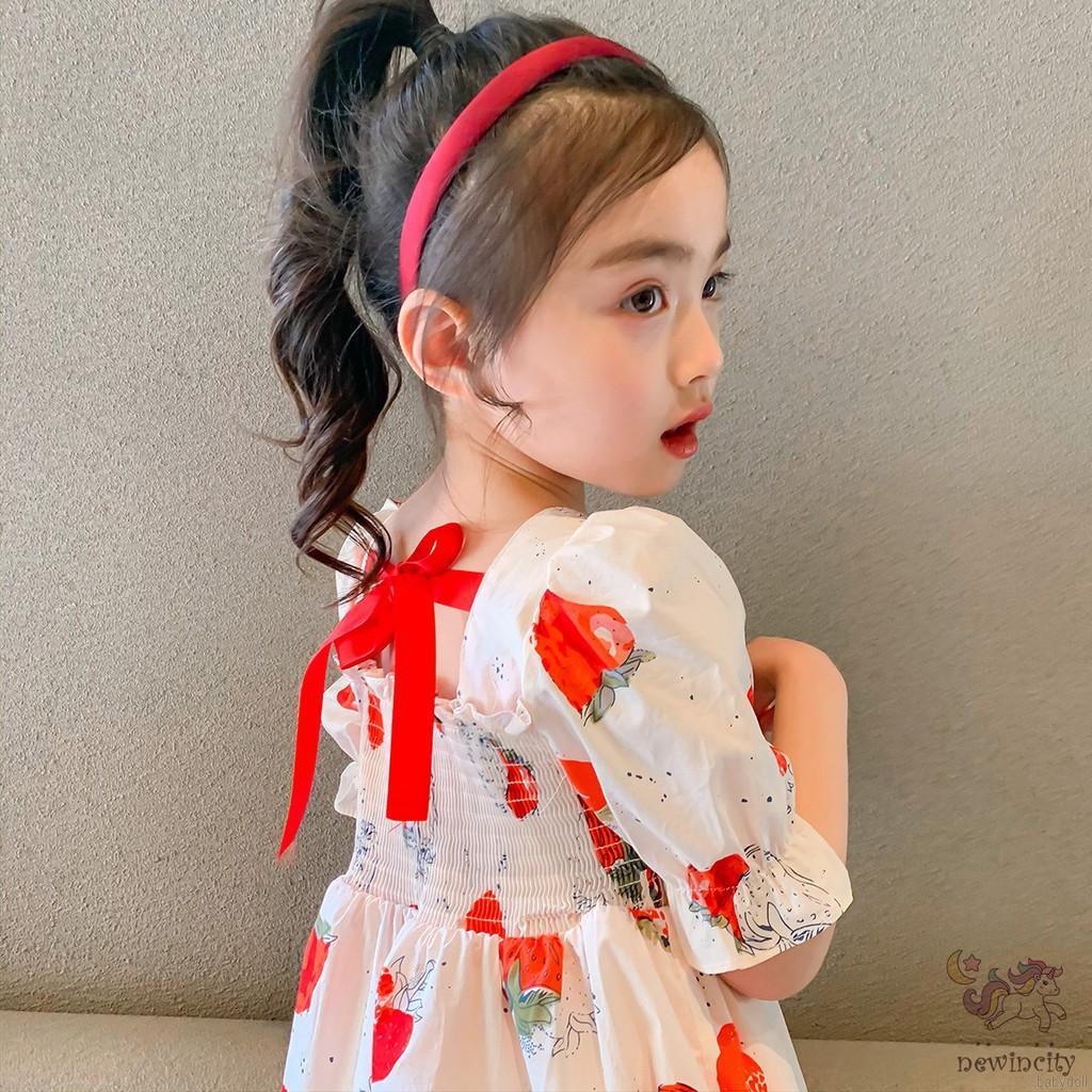 Đầm tay phồng in hình quả dâu cho bé gái