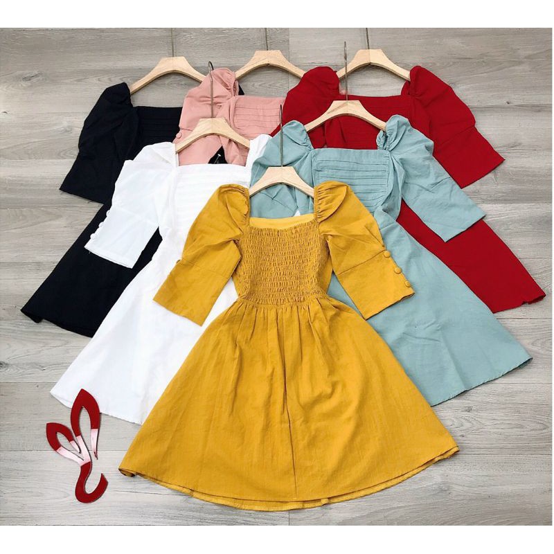 Đầm nút bọc tay phồng xép ly ngực mocking