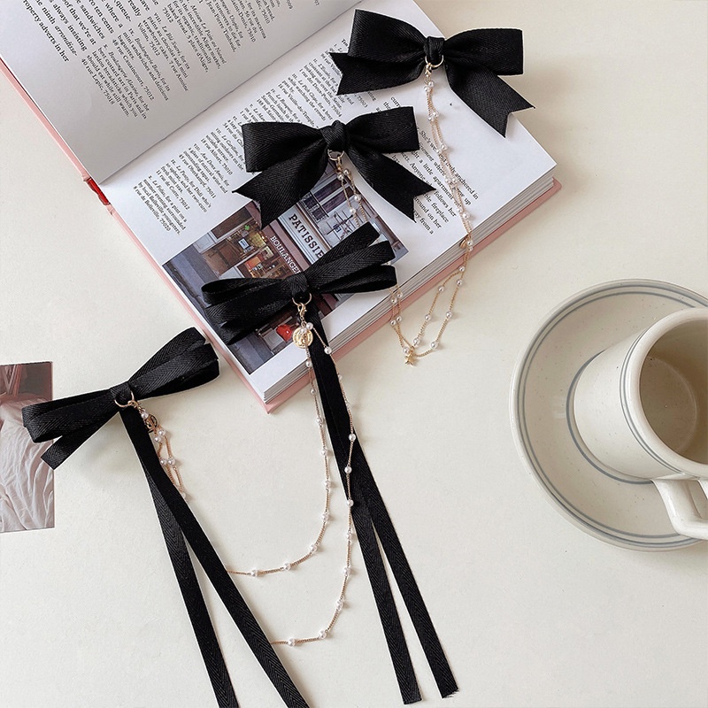 Kẹp tóc ruy băng màu đen thắt nơ phối tua rua thời trang dành cho nữ