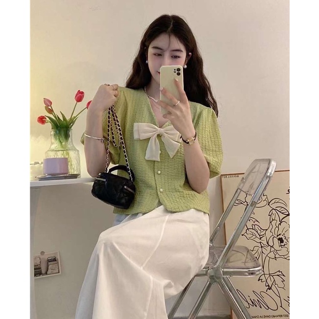 Áo cổ tim sần nơ cài