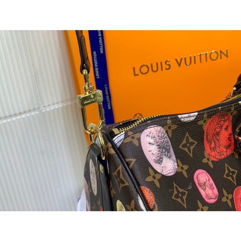 Túi du lịch dáng trống thương hiệu Louis Vuitton LV da thật cao cấp họa tiết đồng xu