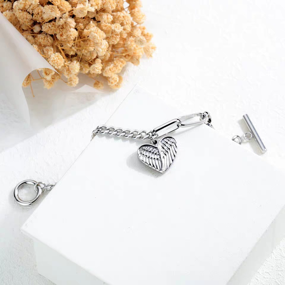 Lắc tay titan đôi cánh phối xích ko gỉ