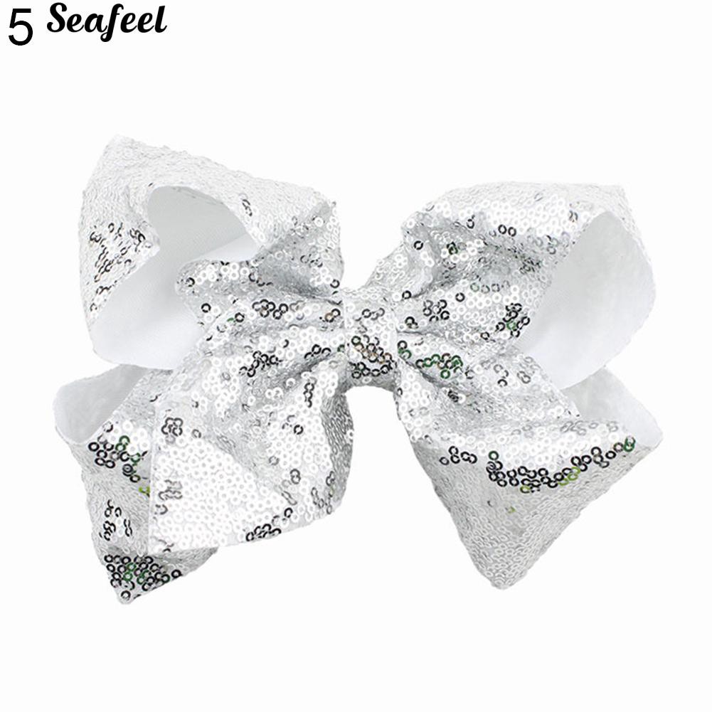 Kẹp tóc hình nơ đính sequin lấp lánh dễ thương dành cho nữ