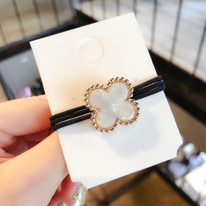 Dây buộc tóc cao su hình cỏ bốn lá đính đá lấp lánh phong cách Hàn Quốc cho nữ