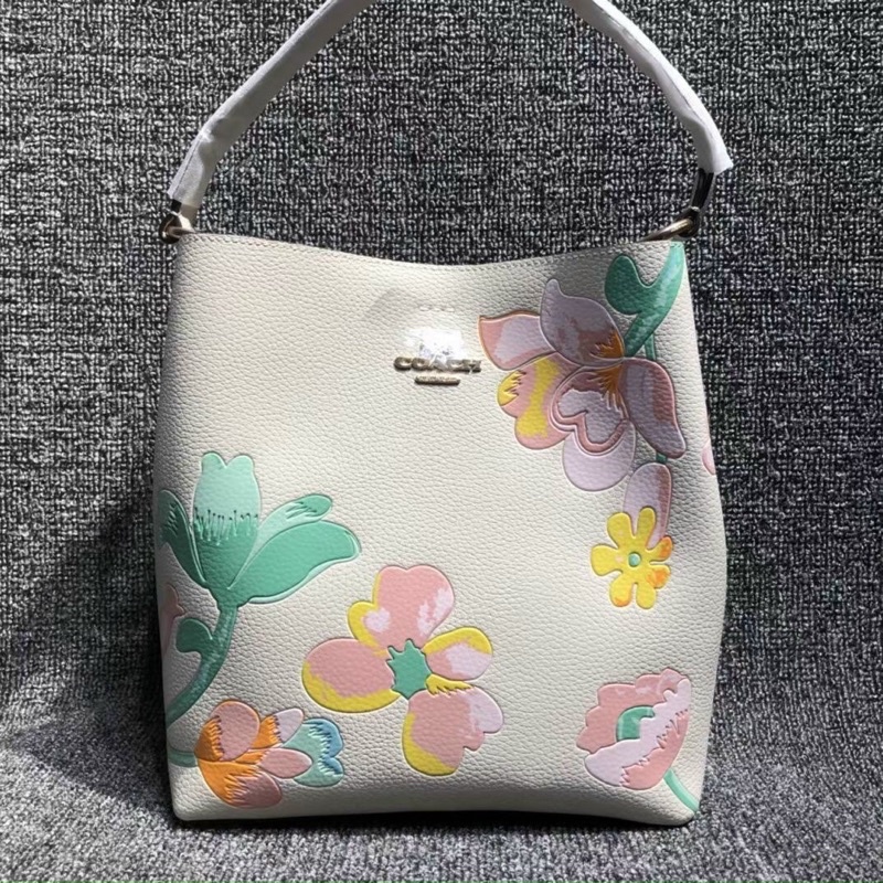 Túi bucket Coach hoa xinh size to, chất da thật mềm mại, kẹp nách hay đeo chéo đều đẹp