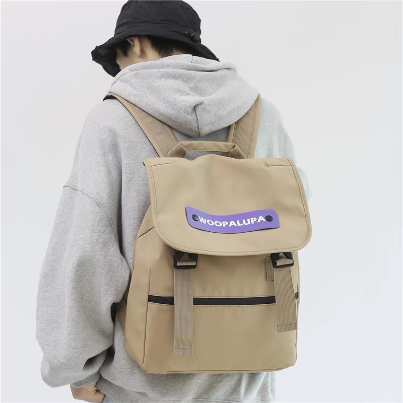 Balo Woo Unisex Quai Cài Khuy Hai Bên Chống Nước Dày Dặn, Balo Đi Học Nam Nữ Tag Da Cá Tính