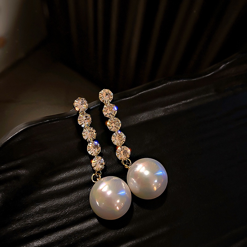 Khuyên tai tua rua dáng dài đính đá ngọc trai độc đáo