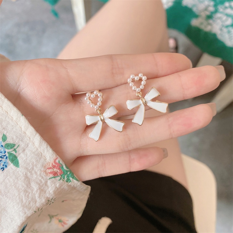 Khuyên tai kẹp không bấm lỗ chốt cố định K051 bằng hợp kim mạ vàng hình trái tim gắn nơ đính hạt trai dáng midi Leous