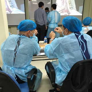 Áo phẫu thuật dùng 1 lần