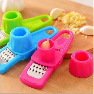 Dụng cụ ép tỏi đa năng