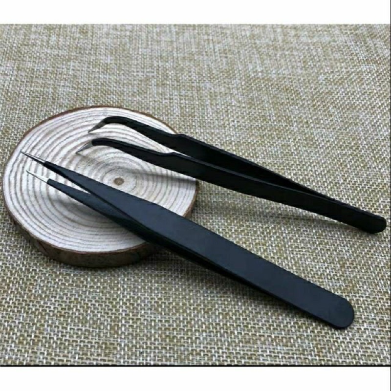 Nhíp gắp đá và hình dán móng