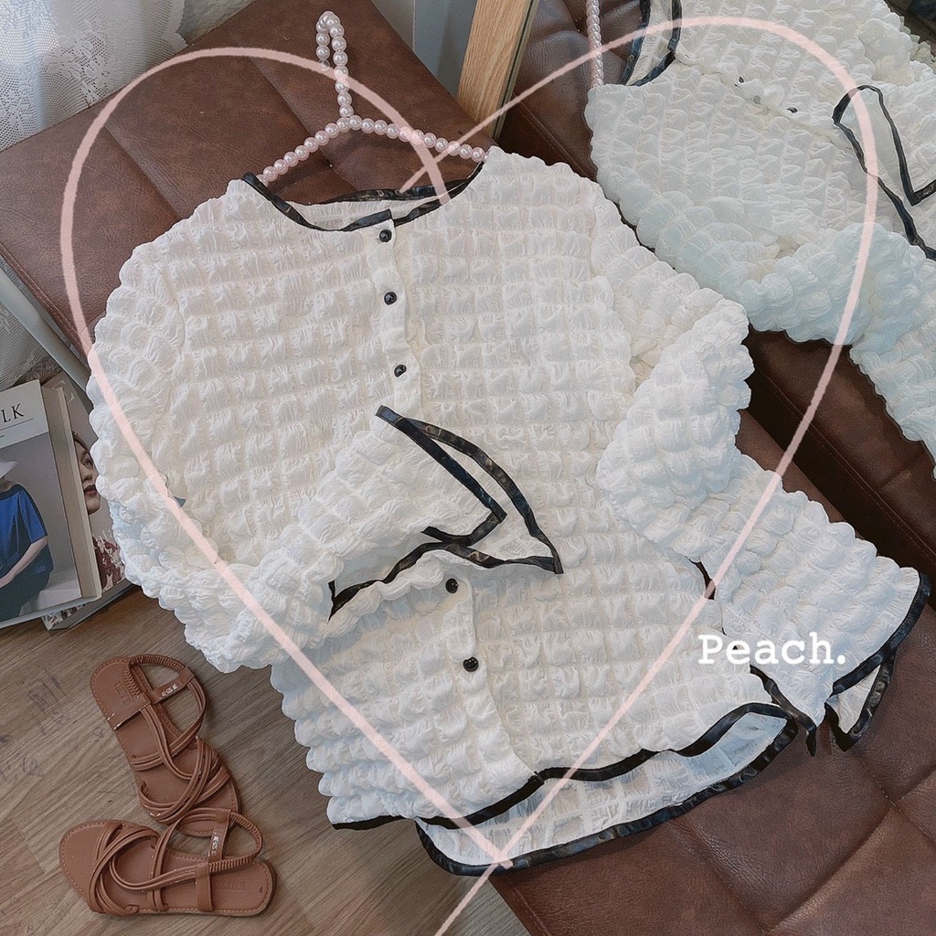 ÁO XỐP TRẮNG VIỀN ĐEN