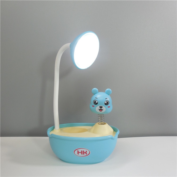 Đèn học chống cận để bàn có pin tích điện đèn led lò xo hình thú có ống cắm bút