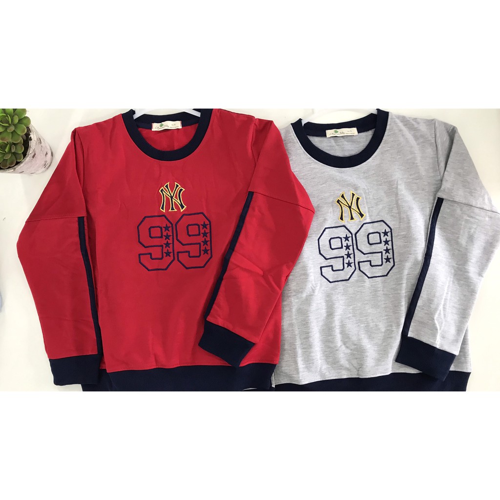 Bộ nỉ da cá bé trai thêu số 99 có size cho bé từ 9-14 tuổi.