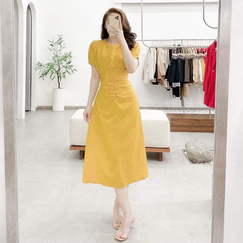 Váy vàng nhún hông xinh xắn v115