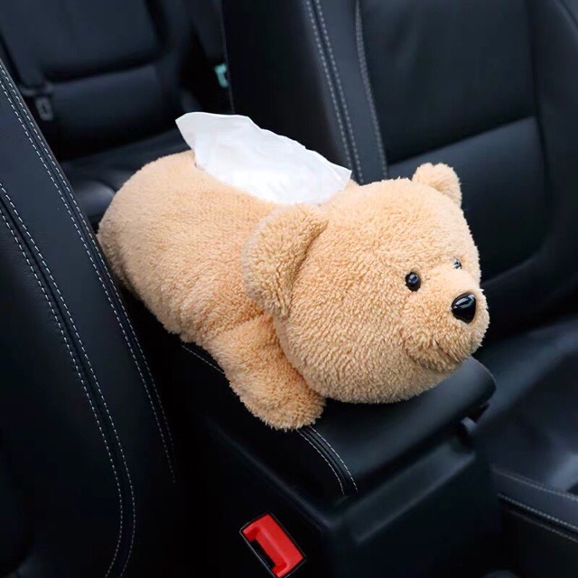 Thú bông để giấy trên xe hơi