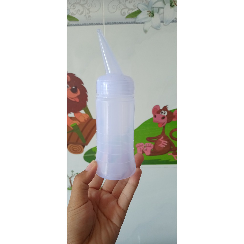 Bình tra dung dịch uốn lạnh dùng dể làm tóc