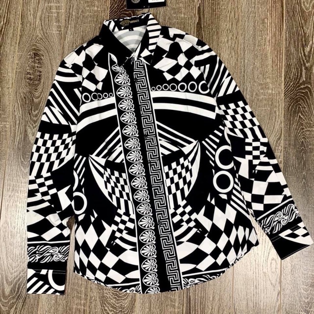 Áo sơmi hoạ tiết hoa văn đen trắng . Nam nữa đều ok 250k hàng có sẵn