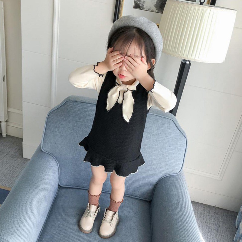 Set áo thun dài tay cổ tròn + chân váy ngắn đính nơ thời trang cho bé gái