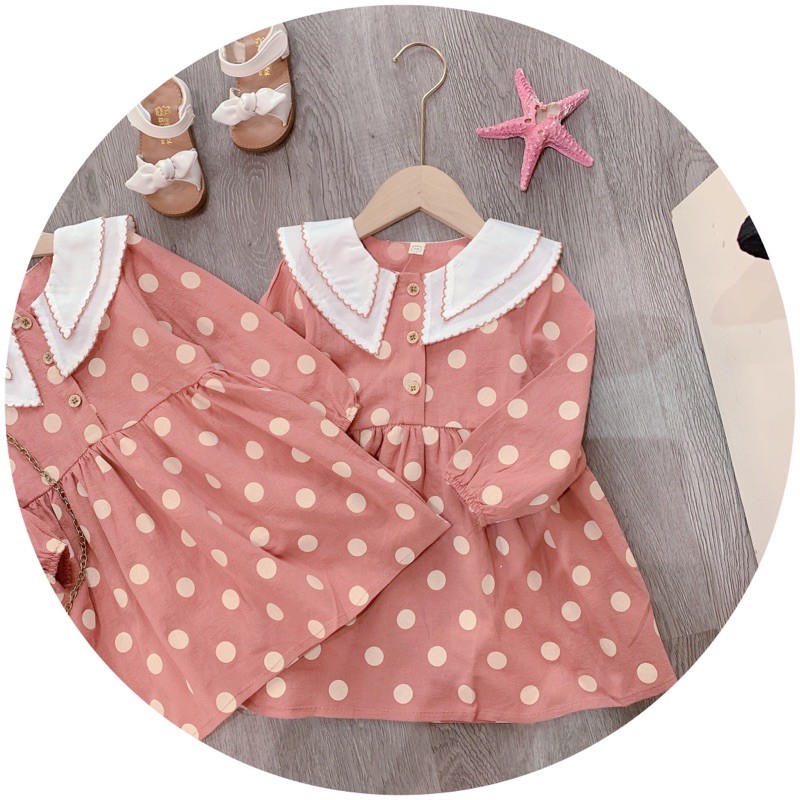 VÁY THÔ CAM CHẤM BI