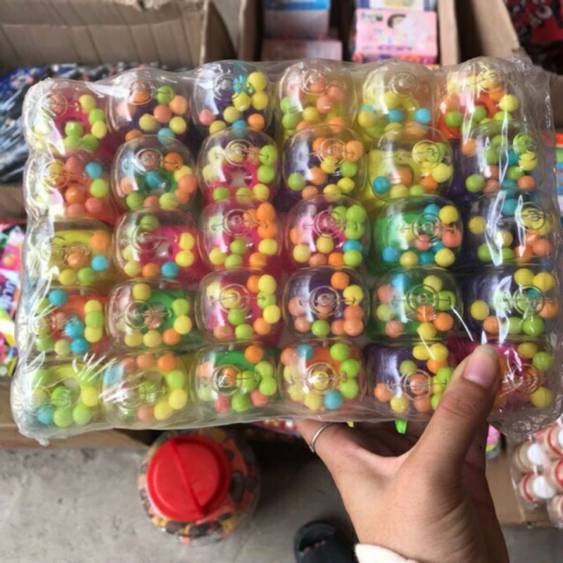 Khay 30 chiếc máy bắn kẹo machin