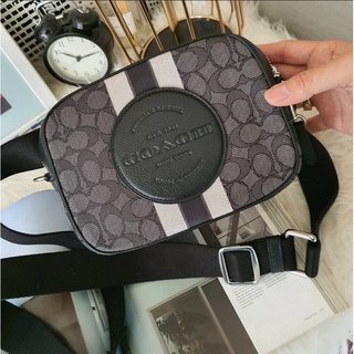 Túi đeo chéo unisex Coach Dempsey