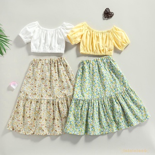 Áo tay ngắn cổ tròn màu trơn và váy dài in hoa cho bé gái