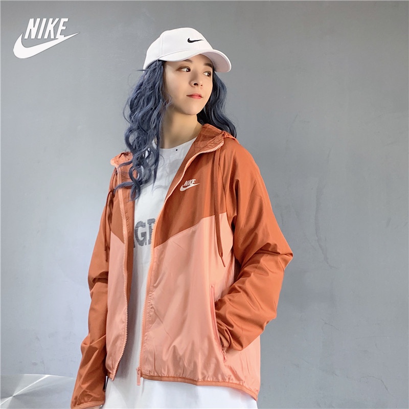 Áo khoác thể thao Nike chống gió có mũ trùm đầu cho nữ