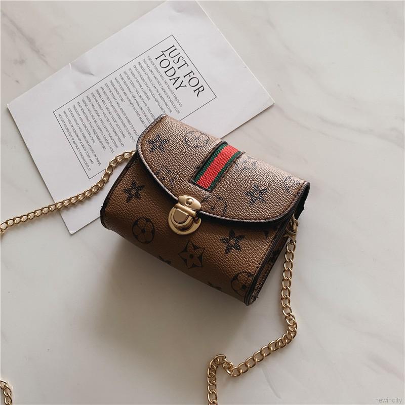 Túi đeo chéo mini bằng da PU họa tiết hoa dành cho bé gái