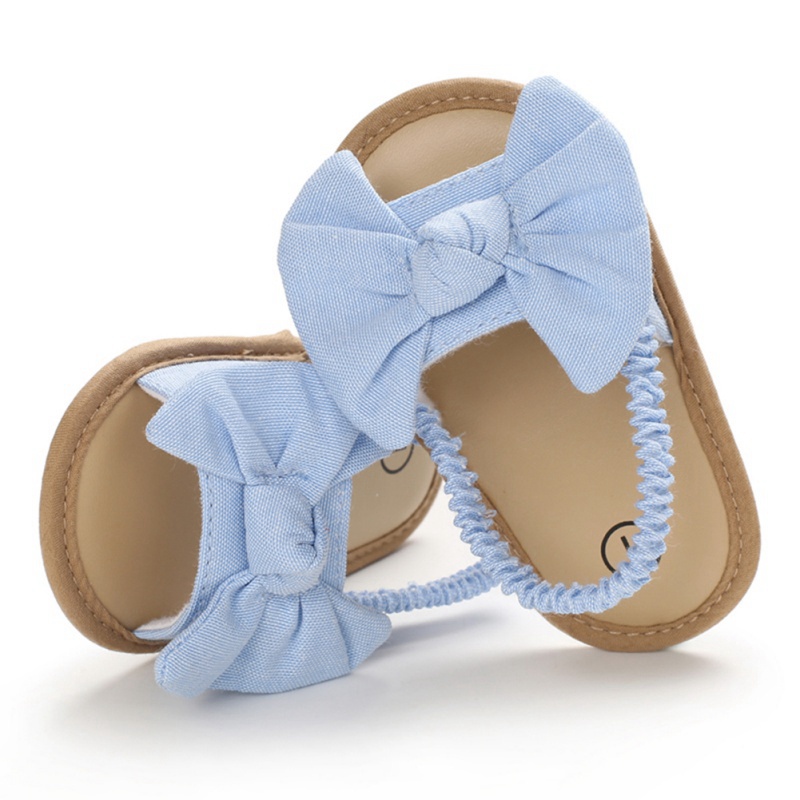 Giày sandal tập đi đính nơ chất liệu vải chống trượt xinh xắn thời trang mùa hè dành cho bé gái sơ sinh