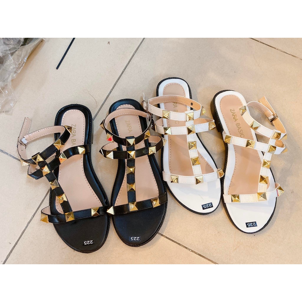 Sandal bệt đế bằng gắn đinh quai chữ i