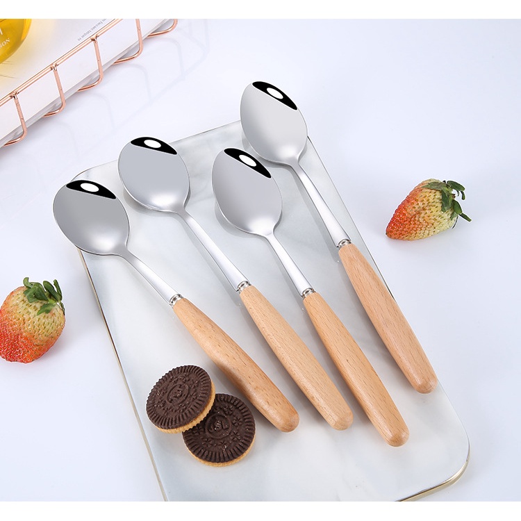 1 Dụng cụ ăn uống bằng thép không gỉ cán gỗ